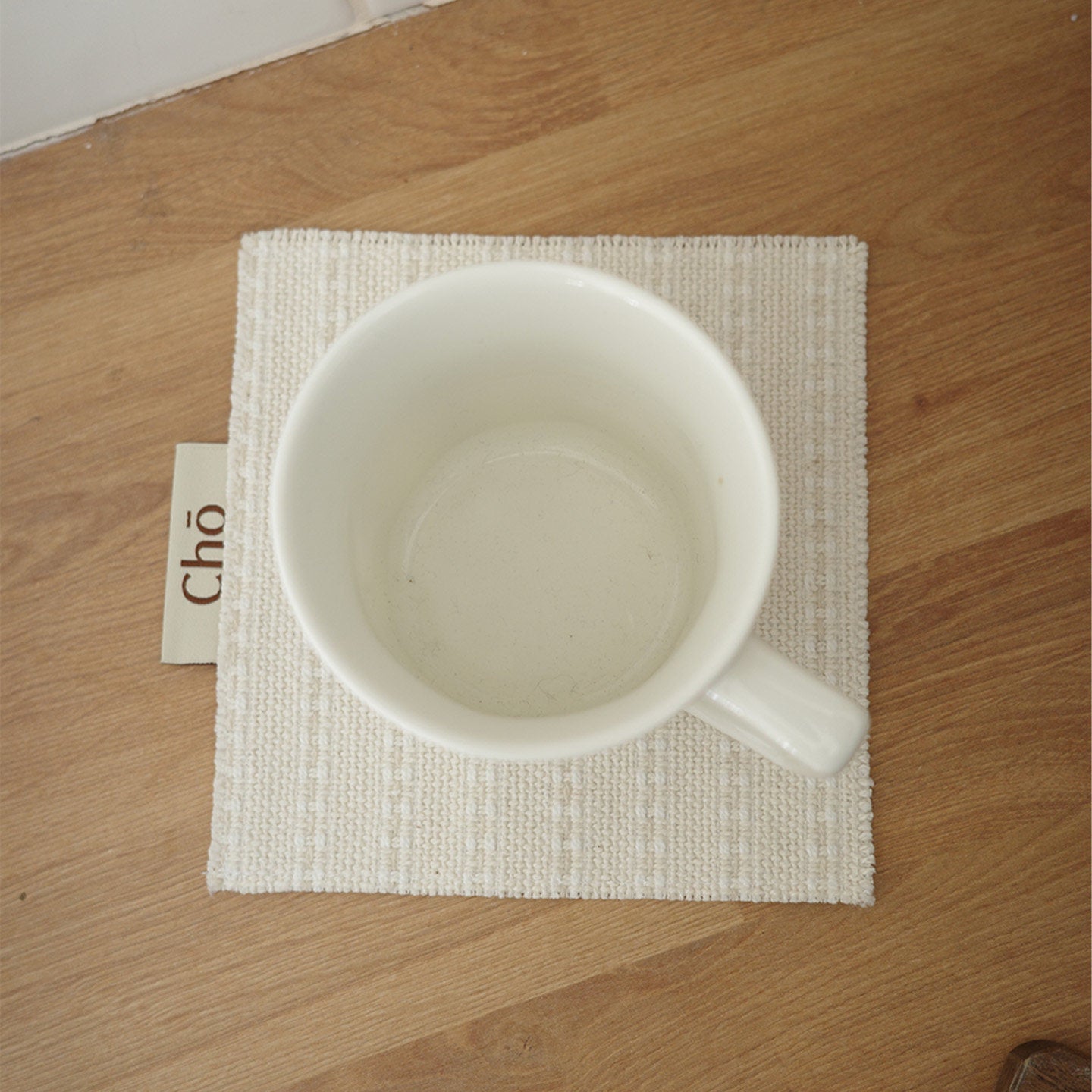 Handgeweven katoenen onderzetter in vintage stijl